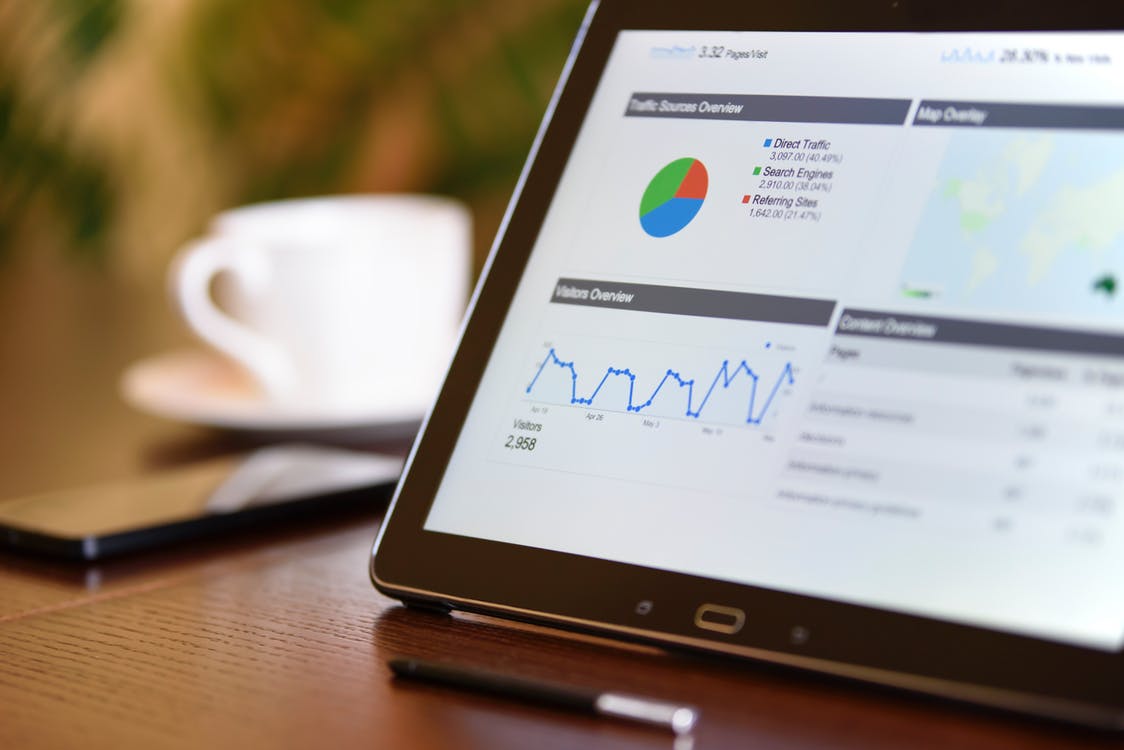 Photo of website analytics charts on a tablet