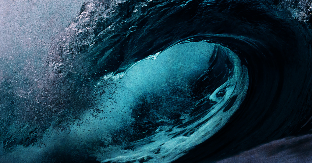 Close-up of the barrel of large blue wave